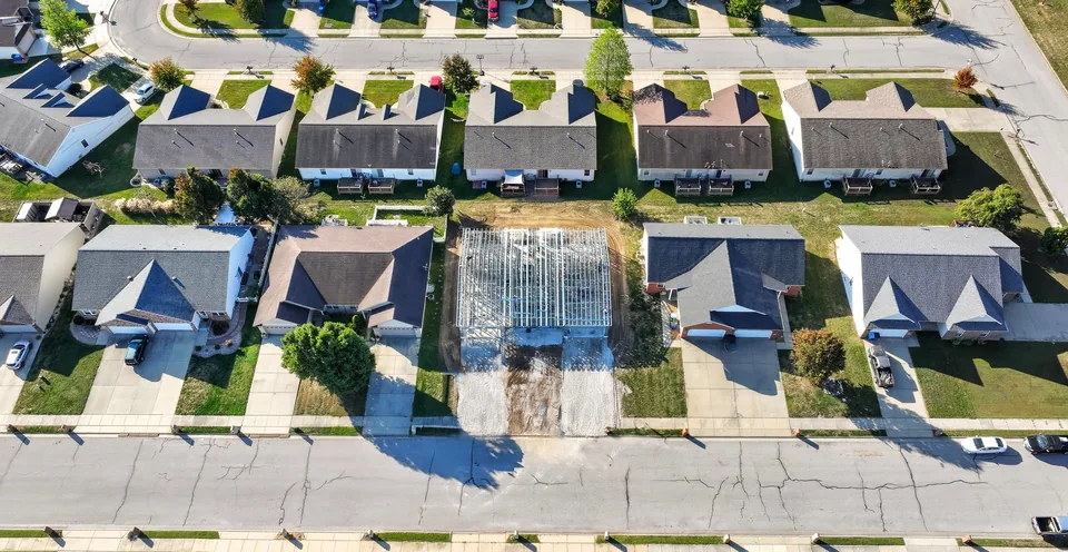 The Duo's steel frame among finished homes in a Highland, Illinois neighborhood, from above